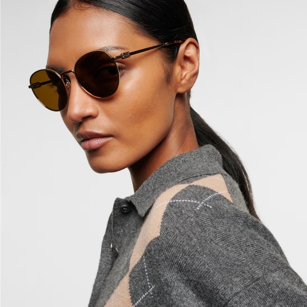 Miu Miu Gold Round Sunglasses